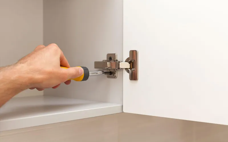 Tightening Cabinet Hinge Screws