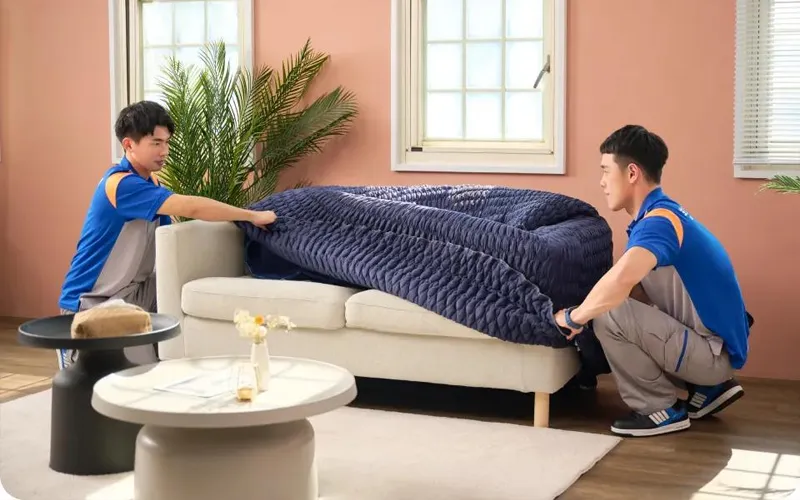 Wrapping a Sofa with Moving Blankets